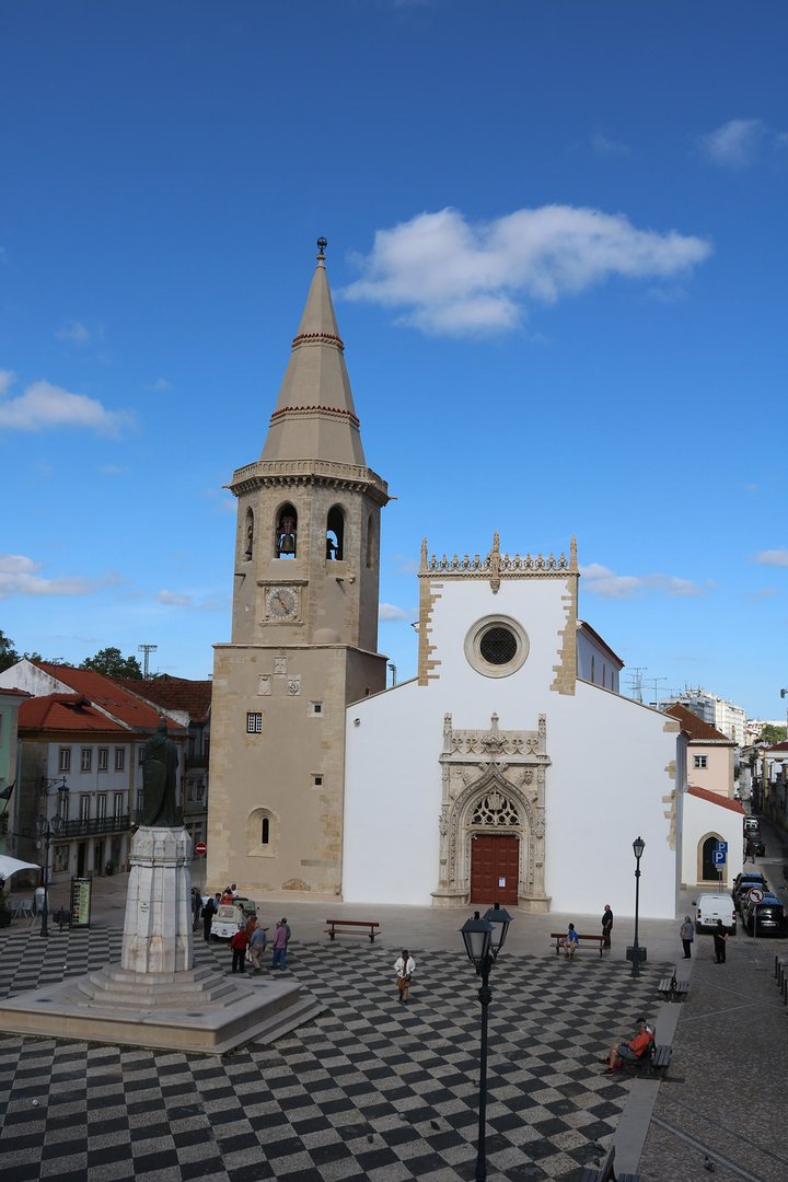 General view of the Church of Saint John the Baptist - The church has a rectangular layout, structured in three naves and a bell tower with a 16th century clock.